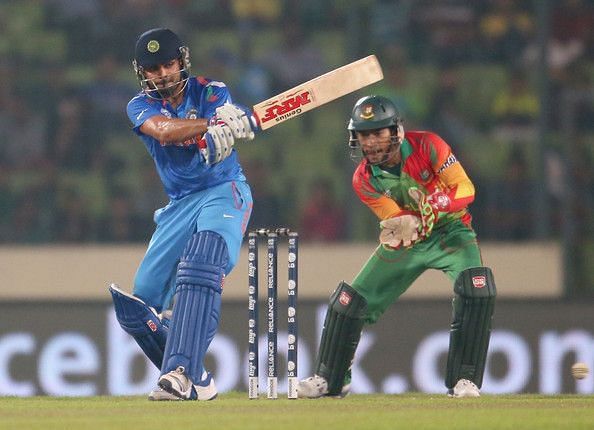 Image result for Mushfiqur Rahim and Virat Kohli 2014
